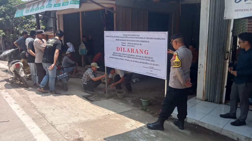 Polres Pandeglang Laksanakan Pengamanan Pembacaan Sita Eksekusi Tanah dan Bangunan di Munjul 7 WhatsApp Image 2023 11 16 at 22.26.57