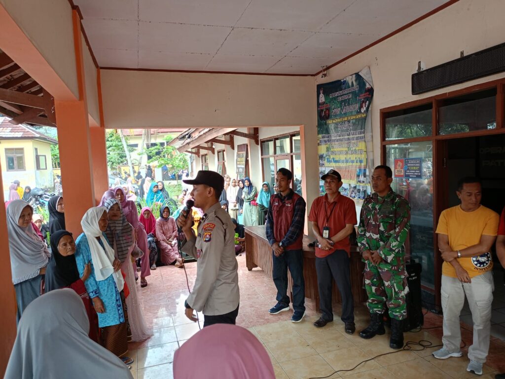 Polsek Jiput Kawal Penyaluran Dana BPNT dan PKH 2 IMG 20240501 WA0028